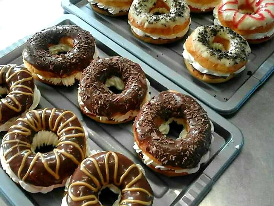 Chocolate topped ring doughnuts from Mr Bake